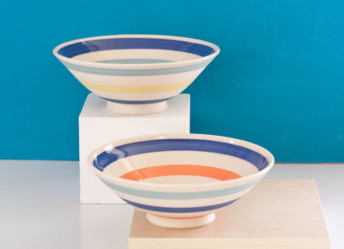 Vibrant bowls with stripes in coloured slips